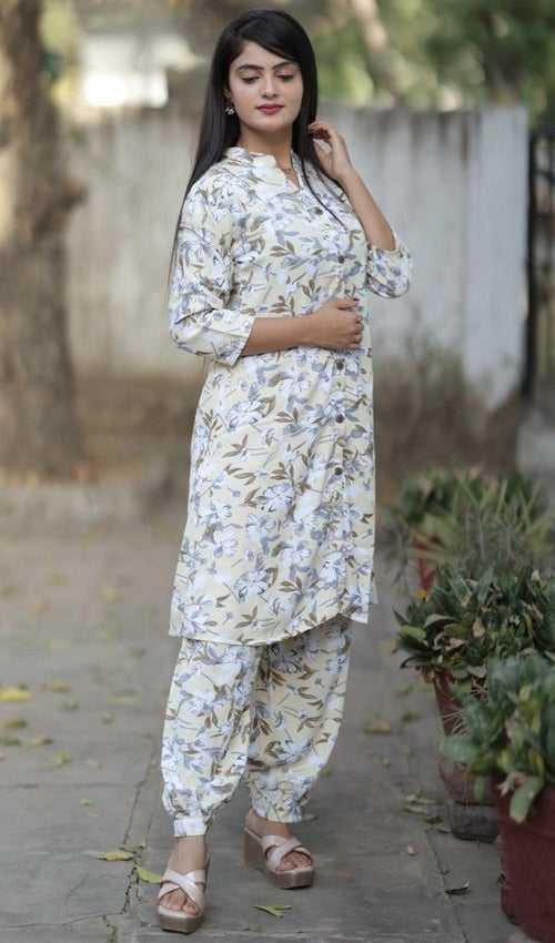 Lovely Cream Color Rayon Fabric Designer Kurti With Bottom