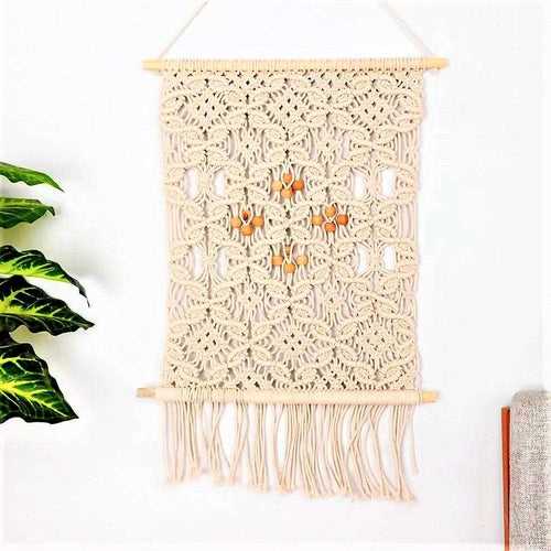 Macrame wall hanging with knots and beads