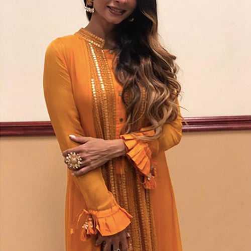 TANISHAA MUKERJI WEARING NISSI ORANGE DRESS