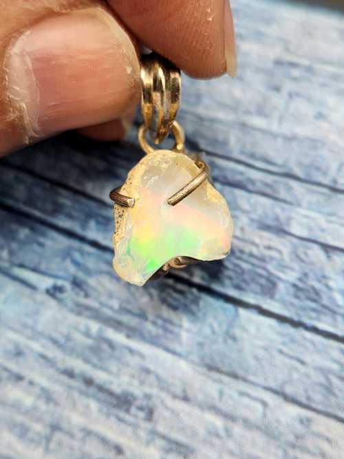 Ethiopian Opal Rough Single Stone Pendant in Silver - A Radiant Gemstone Treasure