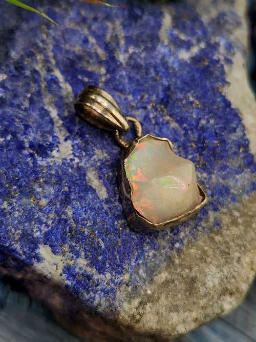 Ethiopian Opal Rough Single Stone Pendant in Silver - A Captivating Display of Nature's Brilliance