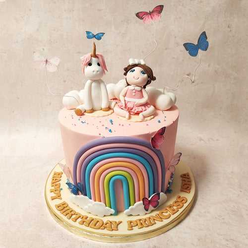 Girl and Unicorn Rainbow Cake