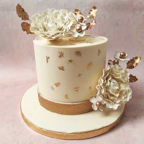 White and Gold Floral Cake