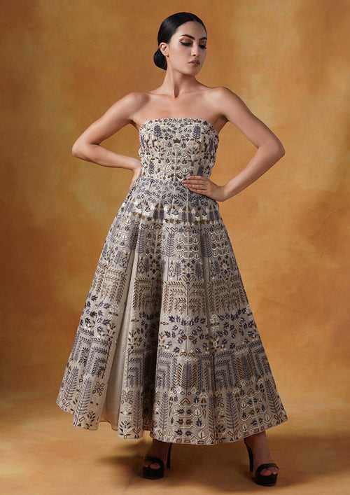 A gorgeous tube gown in linen silk that is beautifully embroidered in silk yarns.