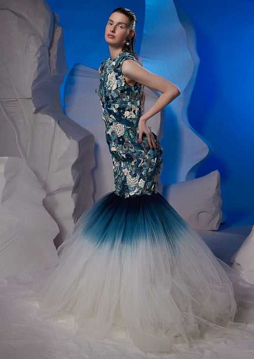 Ivory gown with a blue ombre ghera
