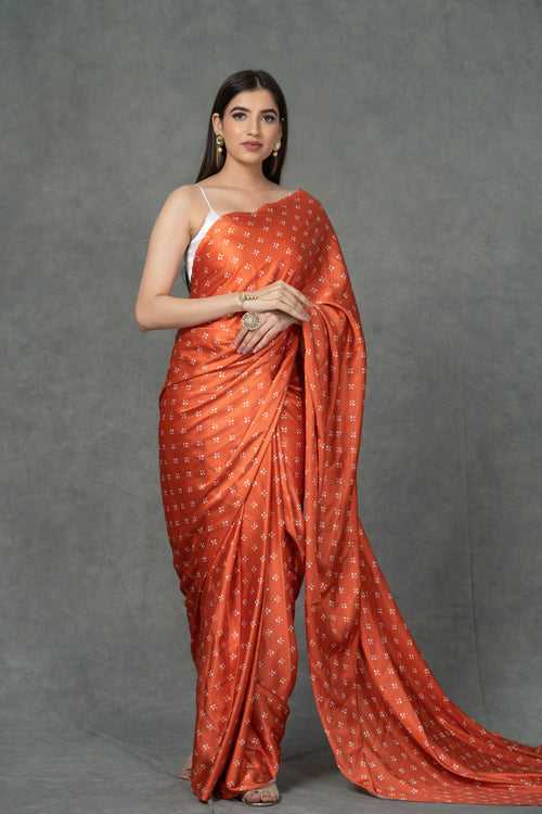 Orange Satin saree with printed florals