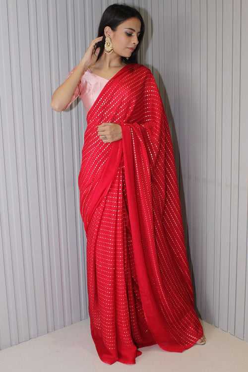 Red chinnon saree with embellishments