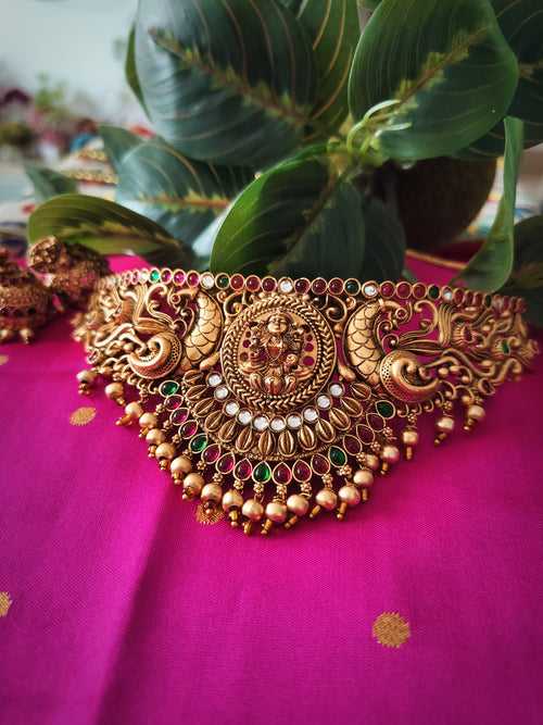 N03067_ Grand classic matte gold polished temple jewelry choker style crafted design gold plated necklace set embellished with ruby and green stones .