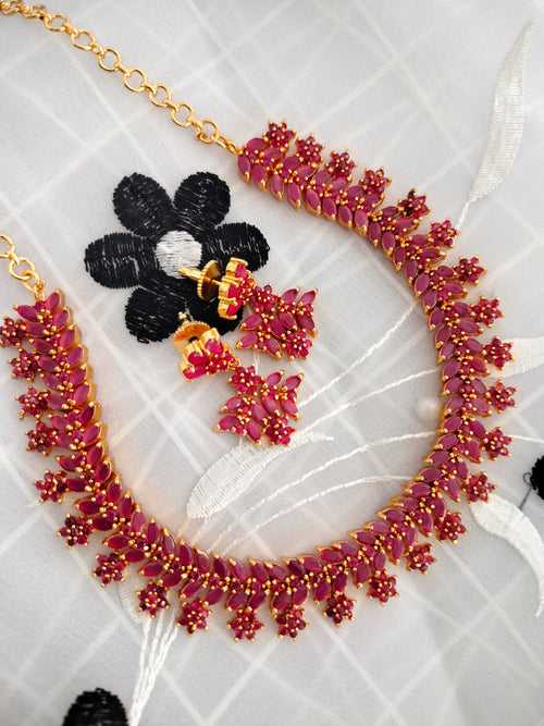 N01172_Grand Lovely designer Gold polished choker Necklace Set  embellished with American diamond stones with delicate Ruby Stones and flower work.