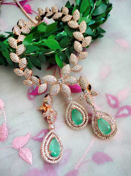 N01168_Grand Lovely designer Rose Gold polished choker Necklace Set  embellished with American diamond stones with delicate Mint Green Stones work.