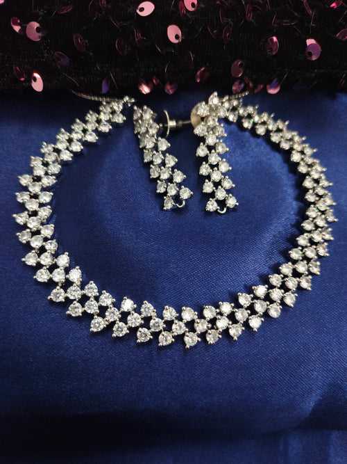 N01178_Grand Lovely designer Silver polished Necklace Set  embellished with American diamond stones with delicate white Stones .