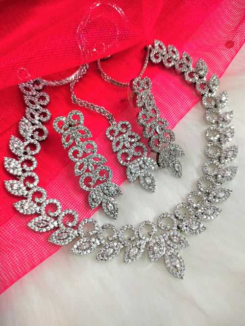 N01181_Grand Lovely designer Silver polished Necklace Set  embellished with American diamond stones with delicate white Stones .