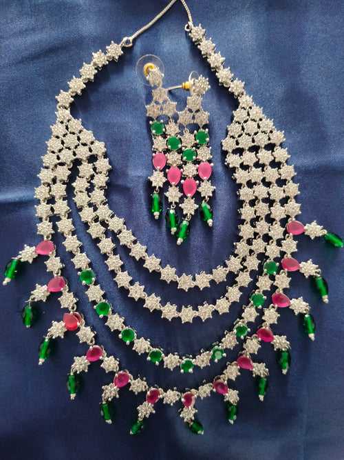 N03008_Classic Silver polished choker style crafted design necklace set embellished with pink &green & white stones .