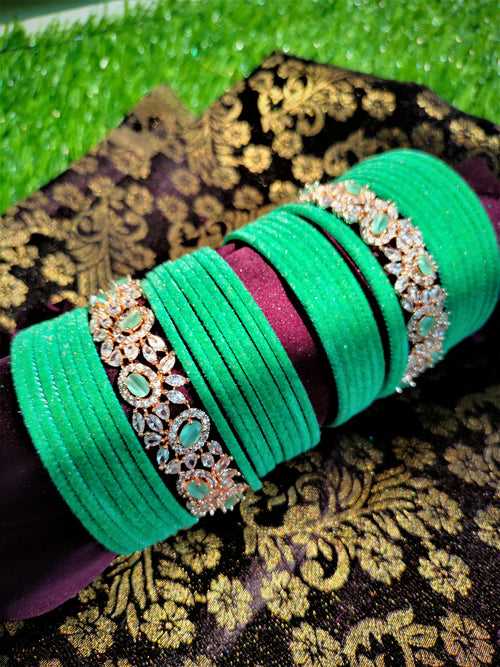 B02004_Elegant flowery design Bangles studded with American Diamond stones with a touch of mint green stones with delicate stone work. Also 2 Dozens of mint green velvet bangles