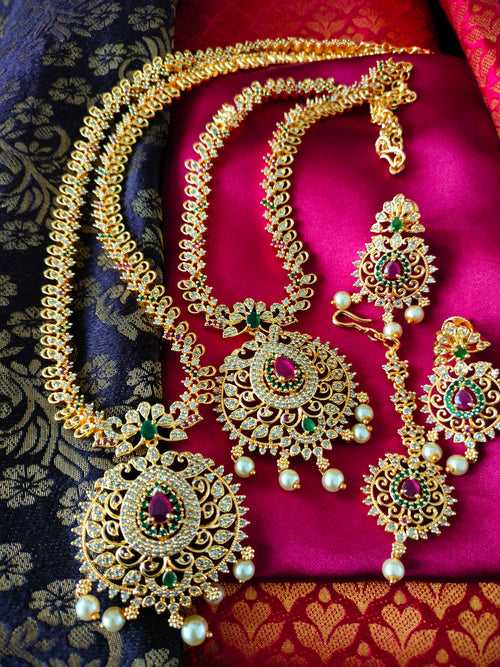 N03033_Bridal Gorgeous  designer gold polished American diamond embellished necklace set with one short & one long designer necklace set, grand earring and maangtika