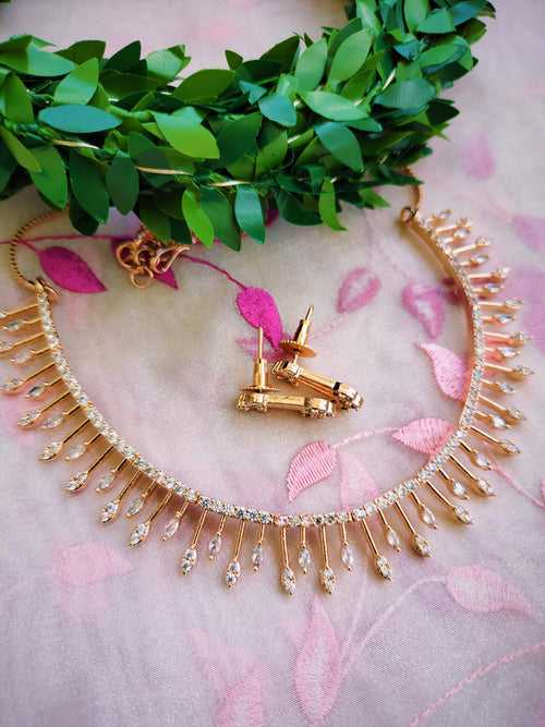 N01167_Grand Lovely designer Rose Gold polished choker Necklace Set  embellished with American diamond stones with delicate white Stones work.