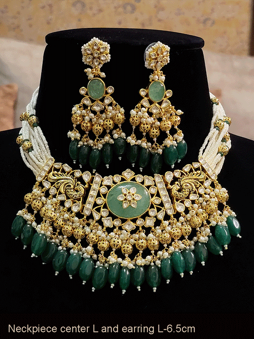 Paachi kundan set with mint green oval center stone with kundan work