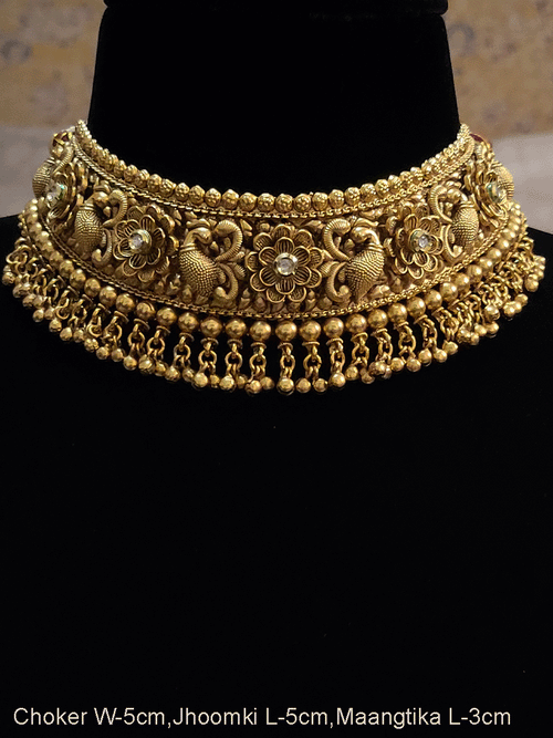 Intricate peacock and flower design with kundan choker setwith ghunghru hangings