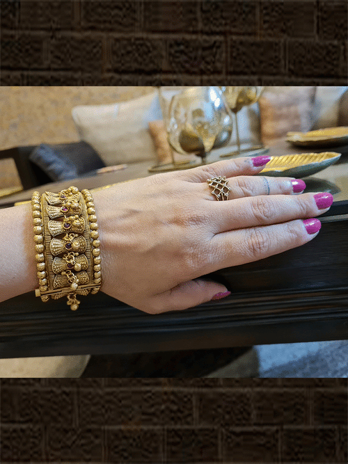 Broad antique gold finish damru design ruby stone openable kada's with hanging ghunghru's