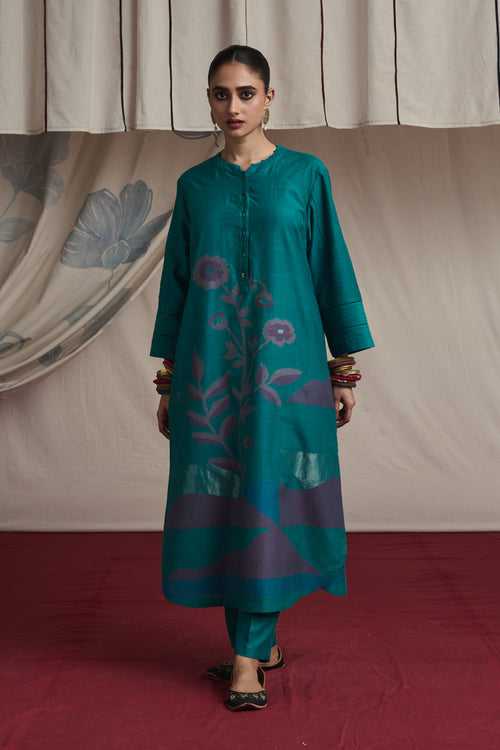 Torquoise hand woven silk and khadi cotton jamdani Harleen kurta set.