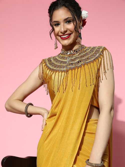 Mustard Lycra Saree with Mirror Embellished Tassled Necklace Cape