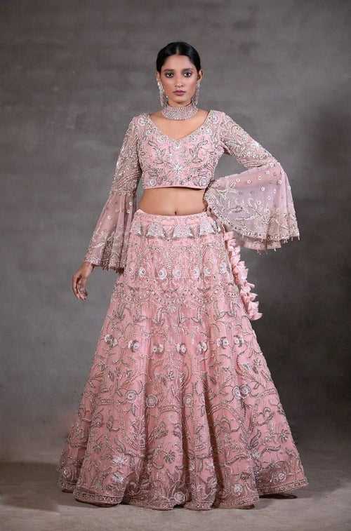 Soft pink peplum Lehenga set.