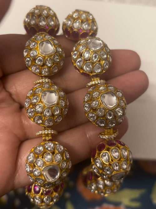 Bracelet/Ponchi (Pair) in Sterling Silver with 18k Gold plated Billor Polki red Quartz Jadau stones. 
Traditional/ethnic design perfect for every look Ponchi/bracelet.
