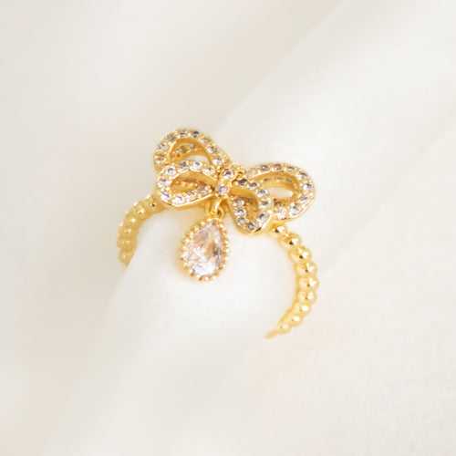 Studded Bow Dangling Ring