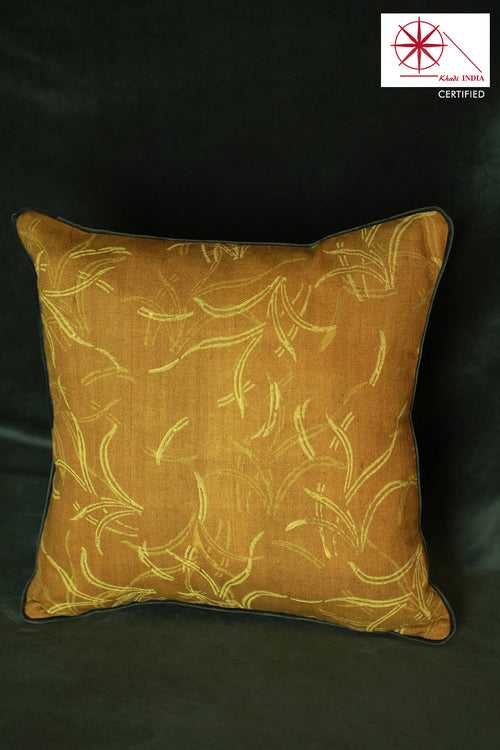 Textured (khadi) cushion cover with vibrant yellow hand block print