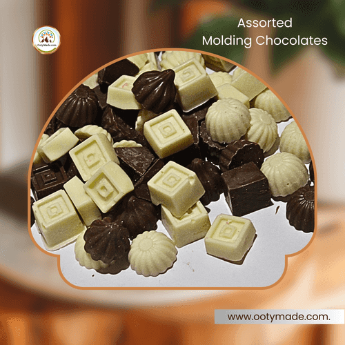 Assorted white and milk ooty homemade molding chocolate with colour wrappers