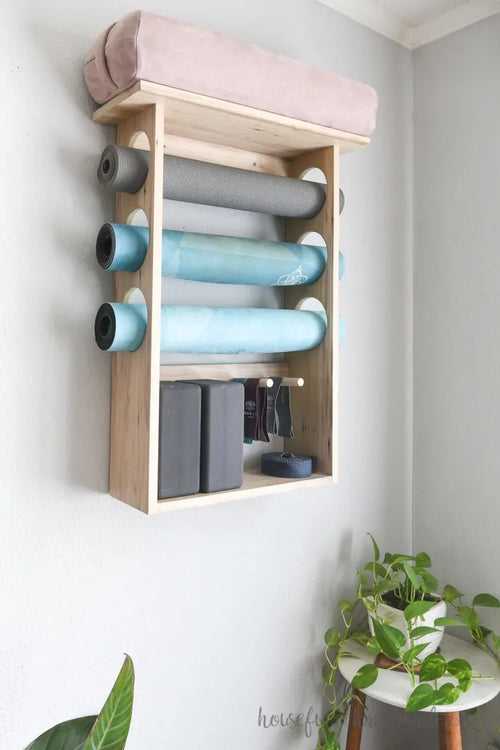 Wall Mounted Exercise Mat Rack Keep Your Workout Area Organized By Miza
