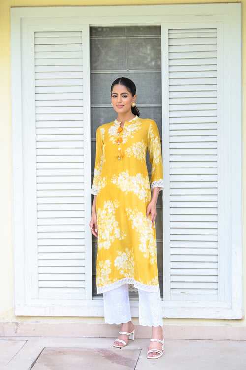 Yellow Bloom Muslin Kurti with Alluring lace and Schiffli pants