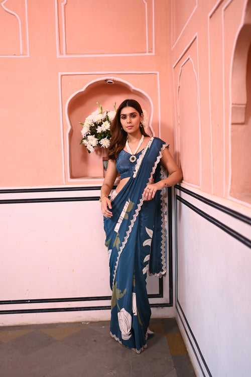 Teal Blue and Pearl White Placement Floral Scallope Mirror Border Pure Crepe Saree