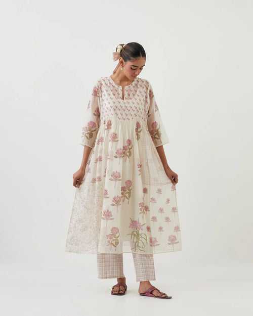 Off white cotton chanderi Kurta dress set with all-over assorted pink colored floral hand block print.