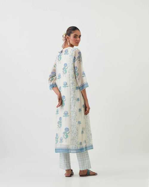 Off white cotton chanderi hand-block printed kurta set with multi-print panels, highlighted with off white ricrac