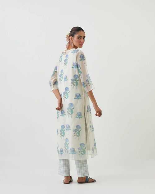Off white cotton chanderi hand block printed kurta set with all-over blue colored flower.