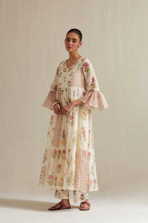 Off white cotton chanderi Kurta dress set with all-over multi colored flower and check hand block print.