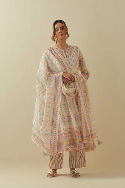 Off white cotton chanderi Kurta dress set with all-over assorted multi colored floral hand block print.