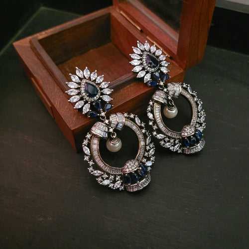 STATEMENT EARRINGS