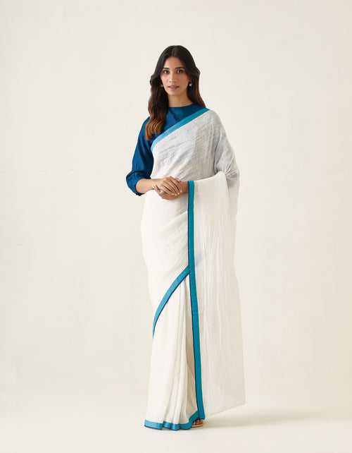 Coordinate Set- Handcrafted White Linen Silk Saree with Color Block Border and Teal Chanderi Blouse (Set of 2)