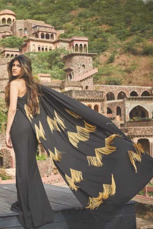 Ananya Birla In Our One Shoulder Sahara Heartbeat Fronge Embroidered Cape Gown With Wait Cut Outs And A High Slit