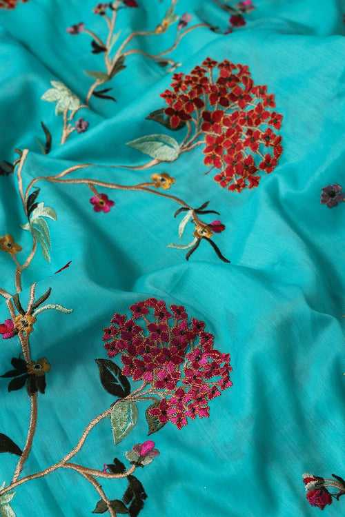 Multi Thread Beautiful Floral Embroidery On Turquoise Blue Muslin Silk Fabric