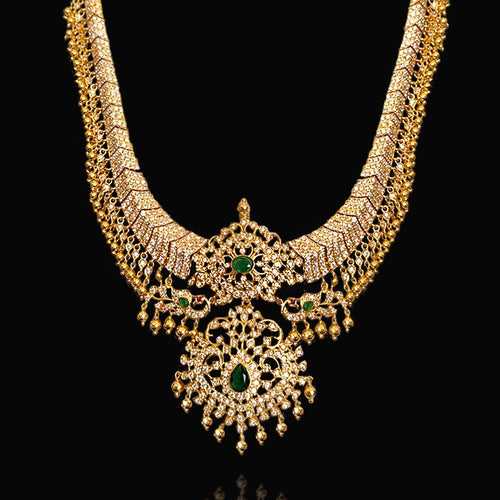 Radiant Splendor - South Indian Haram Adorned in Gleaming Gold Polish