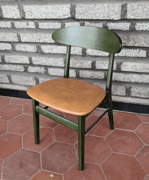 Green Chair with faux leather seat and wooden backrest