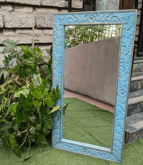 Blue Carved Mirror with Brass details