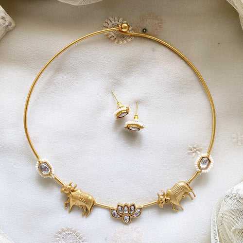 Sleek gold Bull-Lotus kundan hasli set - White