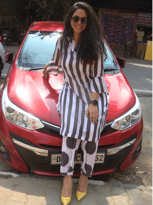 Black and white stripe kurta with functional side plackets paired with pleated polka pants