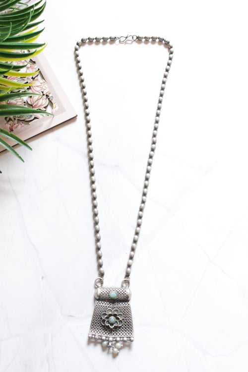 Oxidised Finish Dholki Beads German Silver Necklace with Blue Center Stone