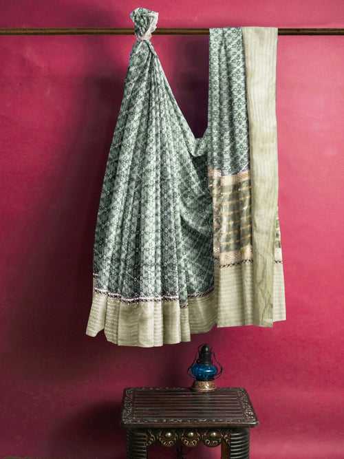 Nakshi Dark Green Hand Printed Organza Saree With Brocade Border & Zari Embroidery And Dabka Work