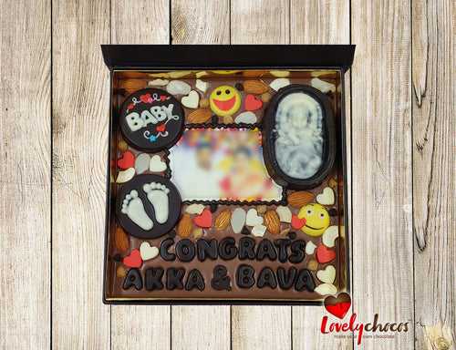 Customized chocolate gift for baby arrival.